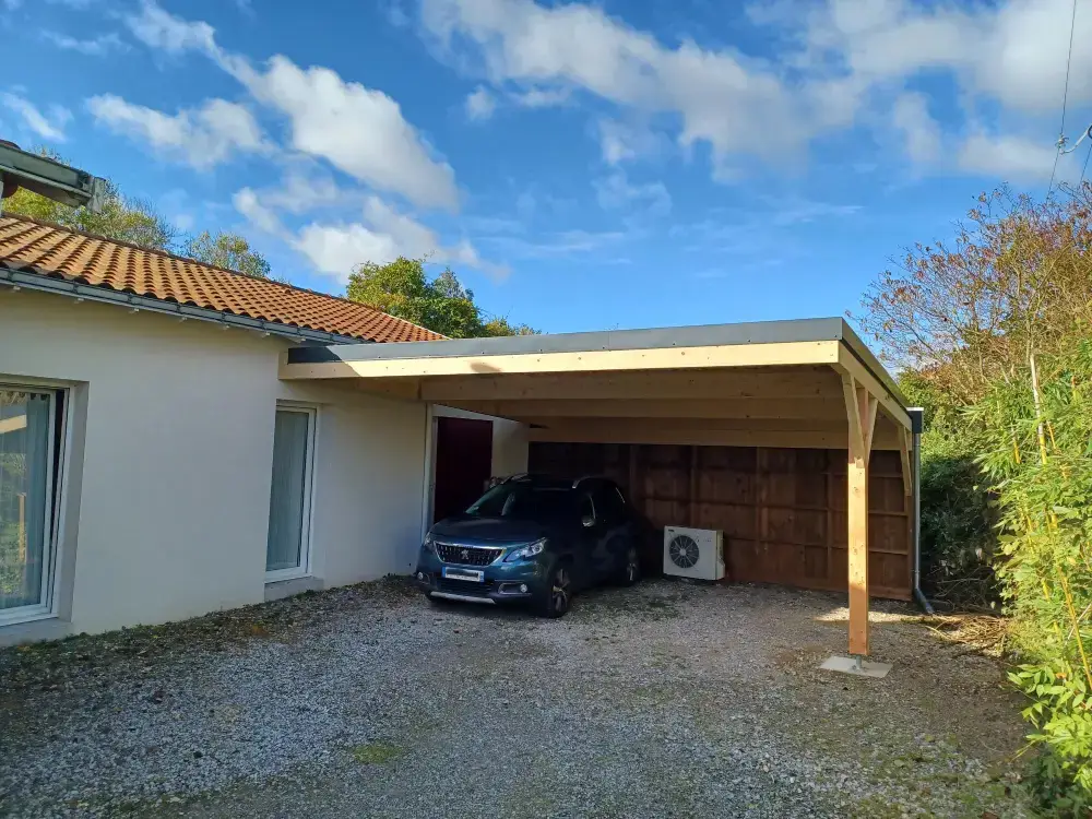 Construction d'un carport accolé à la maison