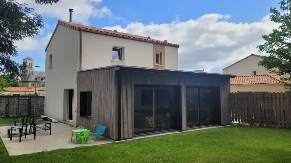Extension en ossature bois avec toiture plate